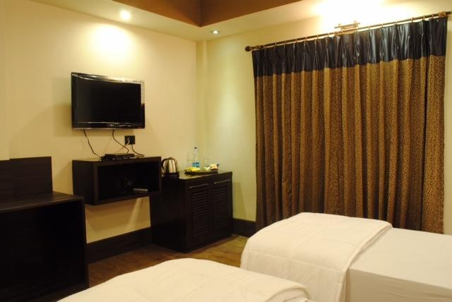 Tangerine Guest House Kalkutta Zimmer foto