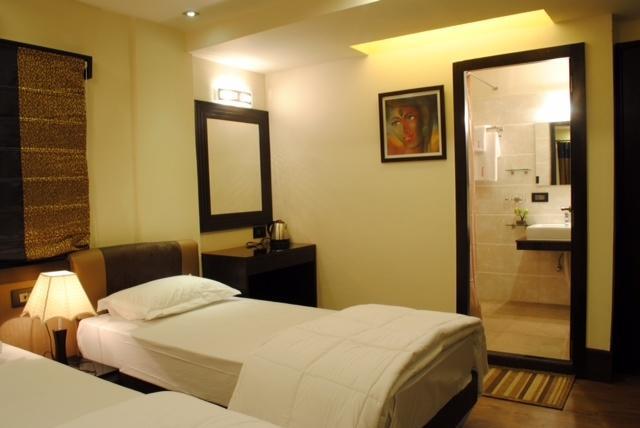 Tangerine Guest House Kalkutta Zimmer foto