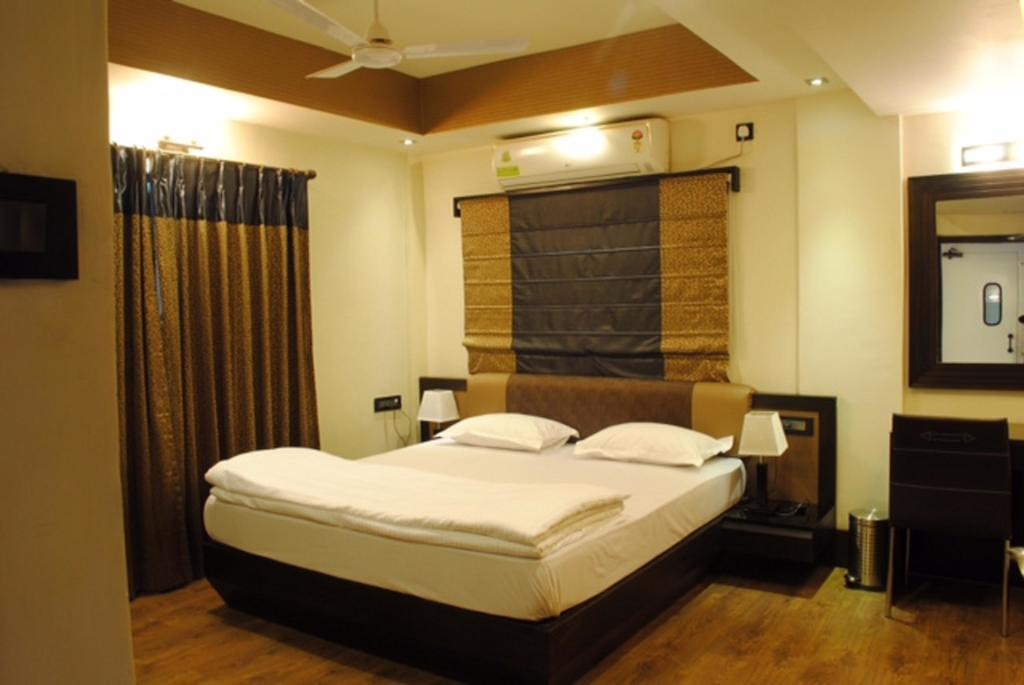 Tangerine Guest House Kalkutta Zimmer foto